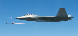 Illustration for article titled Cool photos of Raptors firing missiles from their hidden weapons bays